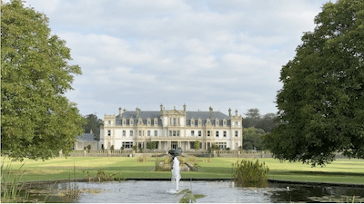 Historic house with fountain in the foreground